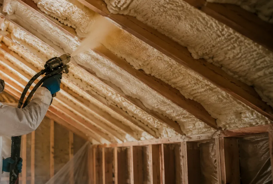 Open-cell spray foam insulation applied to an attic in North Bay Ontario